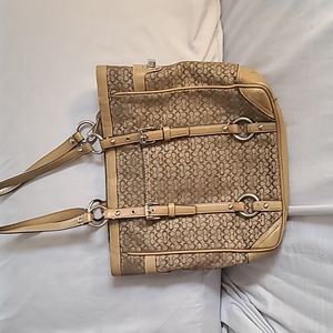 Medium coach shoulder bag brown. 10 in wide 8 in deep